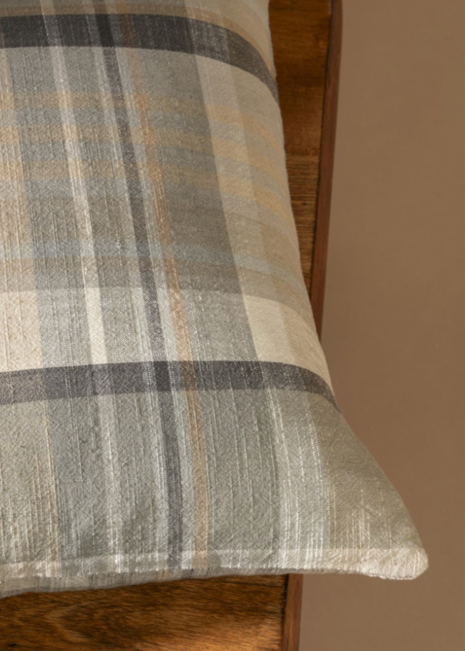 100% cotton woven decorative throw pillow. The Delacourts warm tones and neutral base make it a versatile accent pillow, perfect for modern and transitional interiors. Whether placed on a couch or bed, it adds a sophisticated touch to your decor.