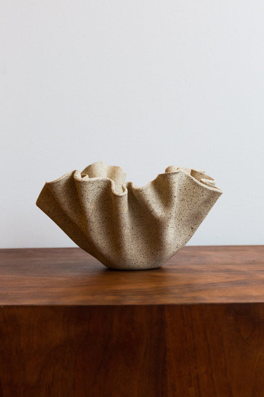 A statement in any space. Unglazed to showcase the beautiful naked cool grey clay with tiny dark specks. Shape and depth will vary drastically on this organically shaped artful bowl. Handmade with love and enthusiasm in Philadelphia.