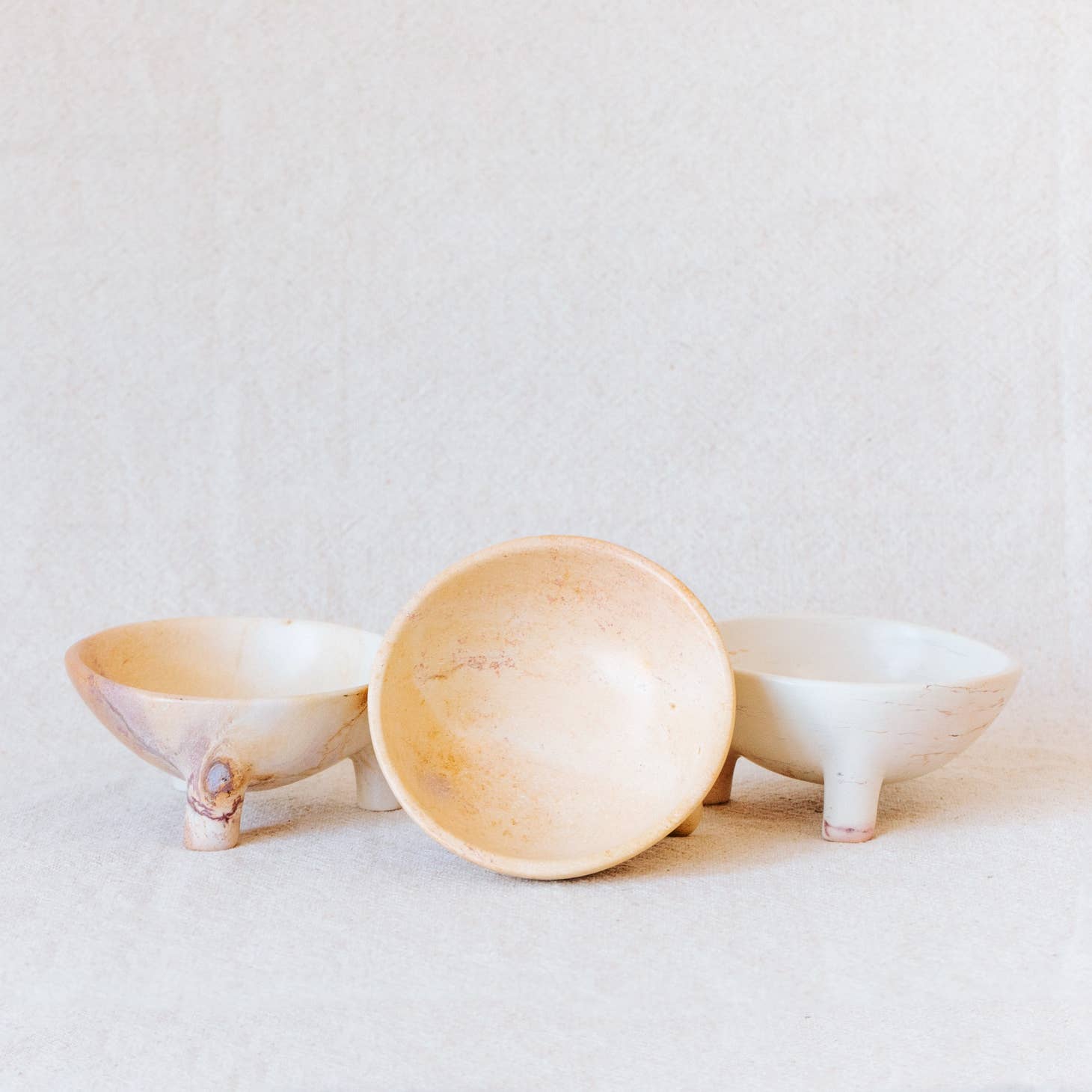 Versatile and visually appealing, this bowl is hand-carved from soapstone in western Kenya. Add them to your table as serving pieces or on your dresser or credenza to hold accessories. Ethically made in Kenya.