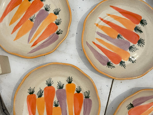 A hand-painted lunch plate designed for your spring and summer gatherings. The perfect lunch or salad plate for your fresh harvests. Your new go-to to impress guests at your home. Wheel-thrown white clay with clear glaze.