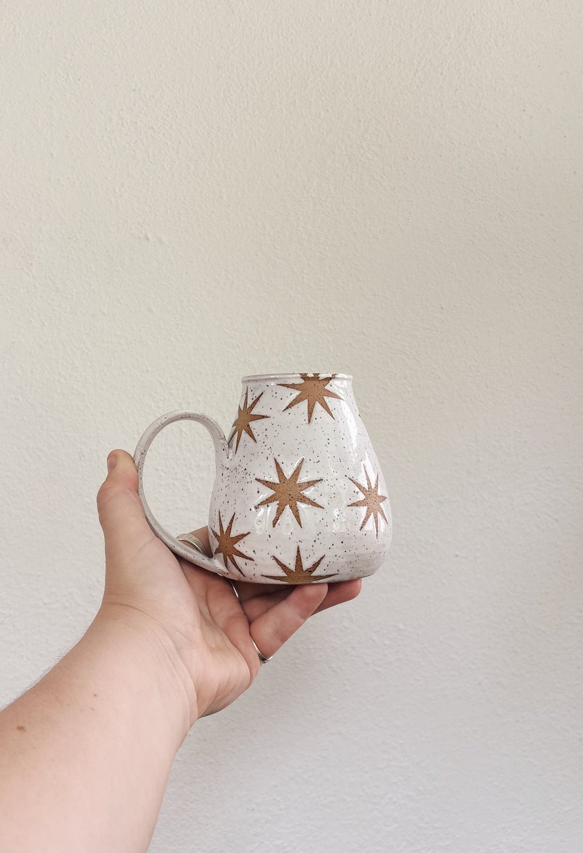 white ceramic star mug gin pottery