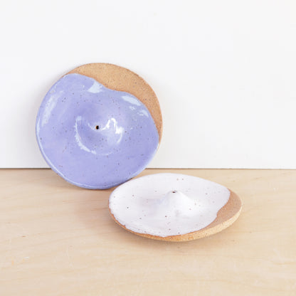 Modern, minimalist incense holder. Made of a speckled stoneware clay, finished with white or lavender glaze. 