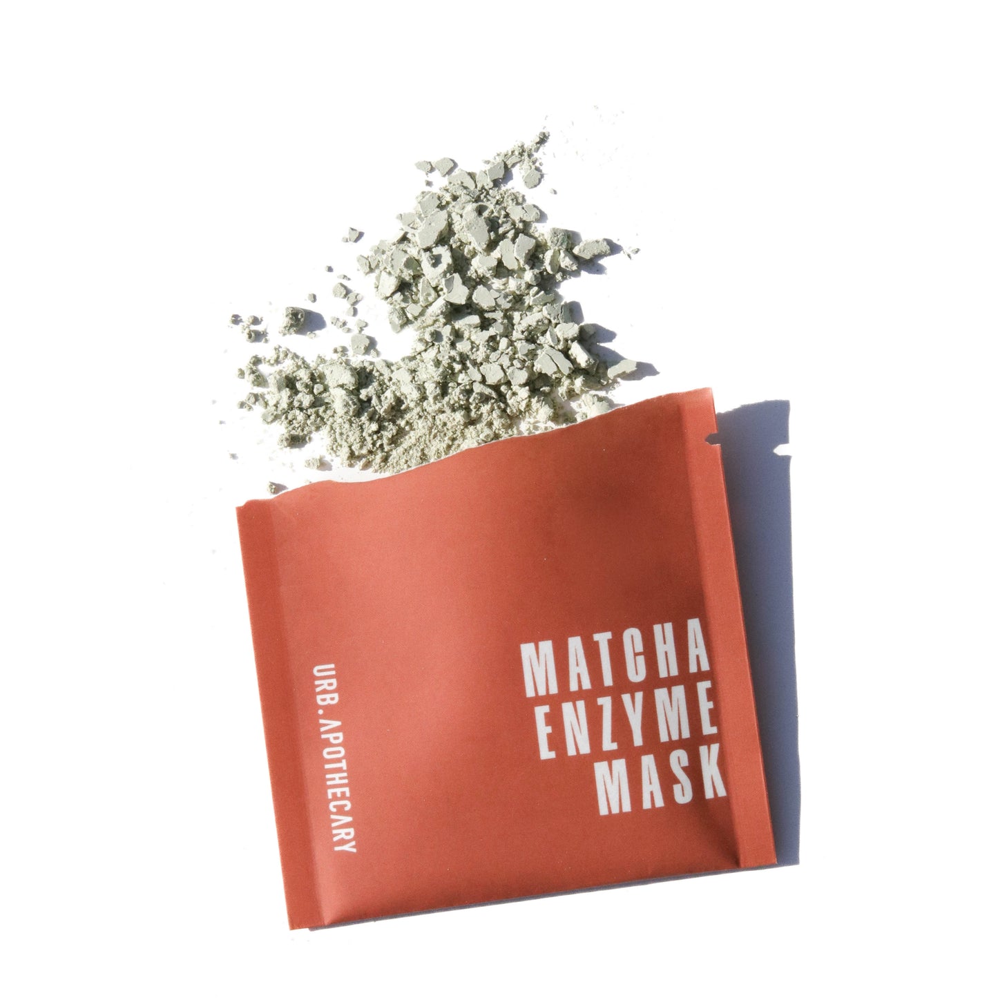 Matcha Enzyme Mask packaging with powder on a white background