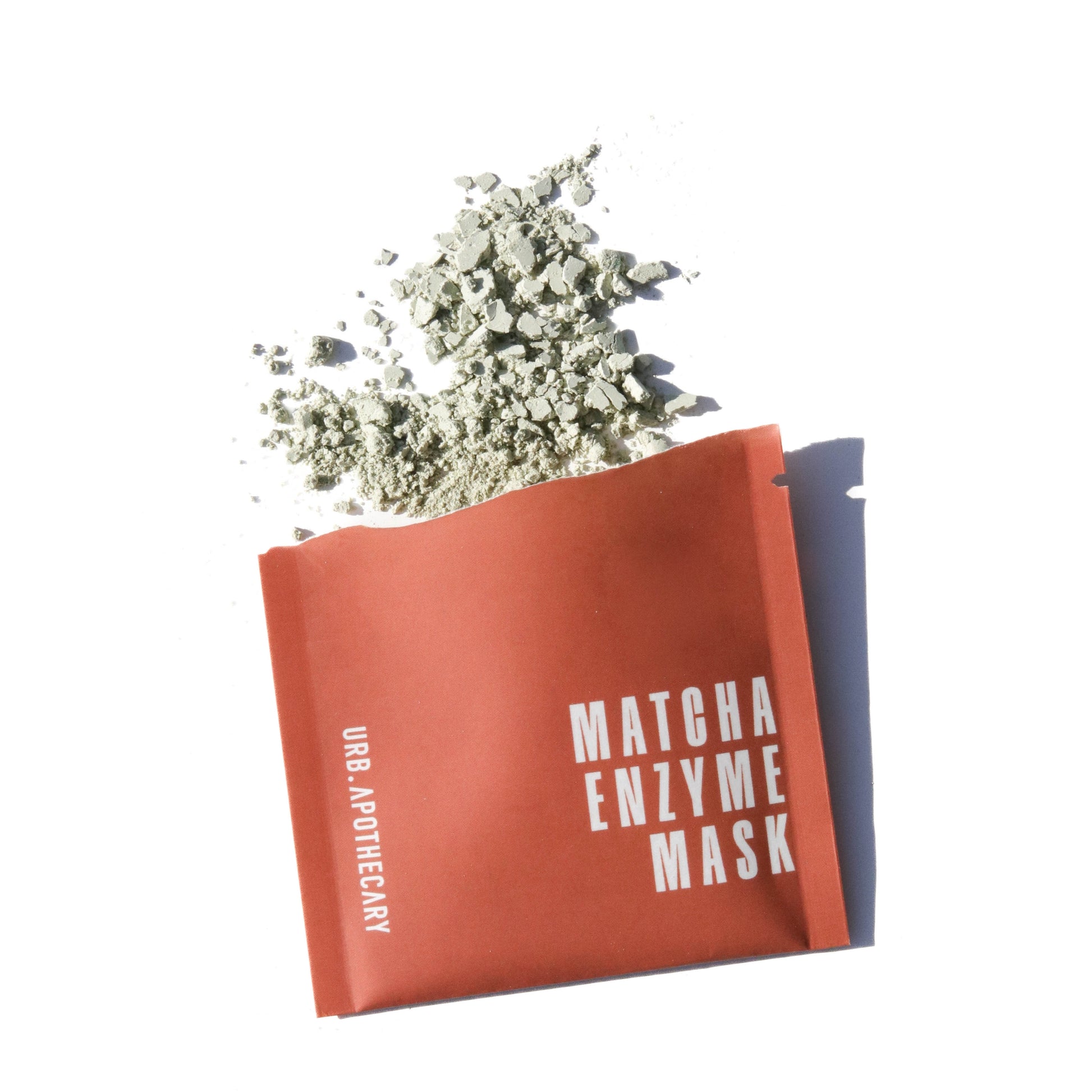 Matcha Enzyme Mask packaging with powder on a white background
