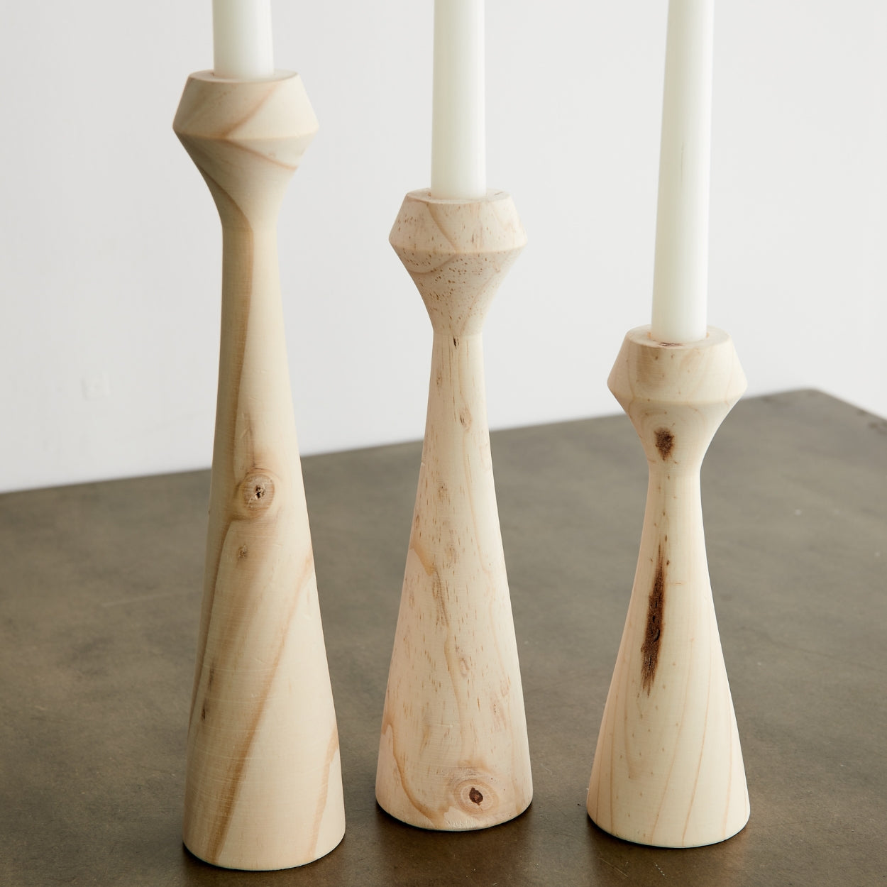 These hand-turned candle holders are expertly crafted by South African artisans that have been in family woodworking businesses for generations. Made from sustainably sourced pine, they are both trend-forward and timeless.