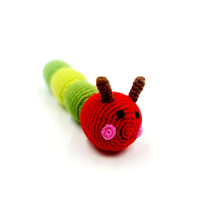 This hand crocheted rattle is designed to delight little hands and engage curious minds. The gentle rattle sound encourages sensory exploration while the soft, tactile textures make it perfect for grasping, shaking, and cuddling.