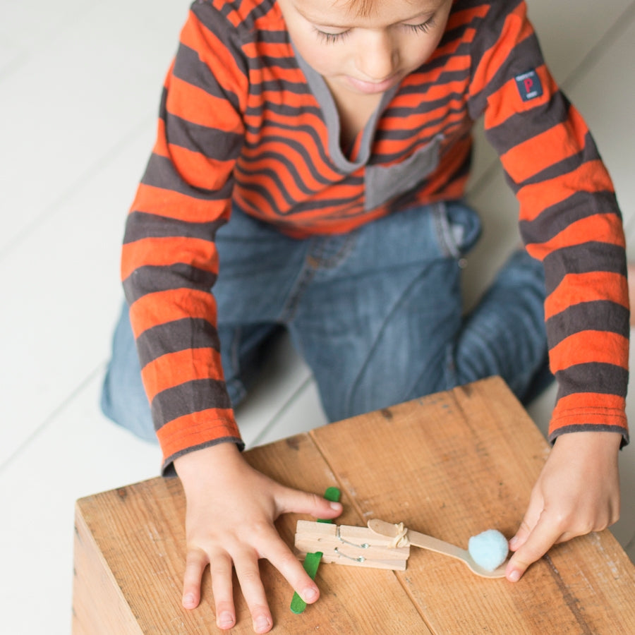 Children can construct a catapult using the pegs, lolly sticks, spoon, elastics & glue dots. Add a pom pom to the spoon & see how far it can fly in the air. Practice makes perfect on the pirate aim. Each kit is plastic free & lovingly assembled by hand.