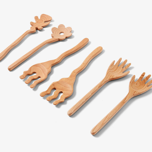 areaware serving friends, flowers wavy / Whoever said food isn’t to be played with hasn’t met Serving Friends.  These wooden spoons, carved into charming shapes, bring joy and humor to your dining table. made with beech wood.