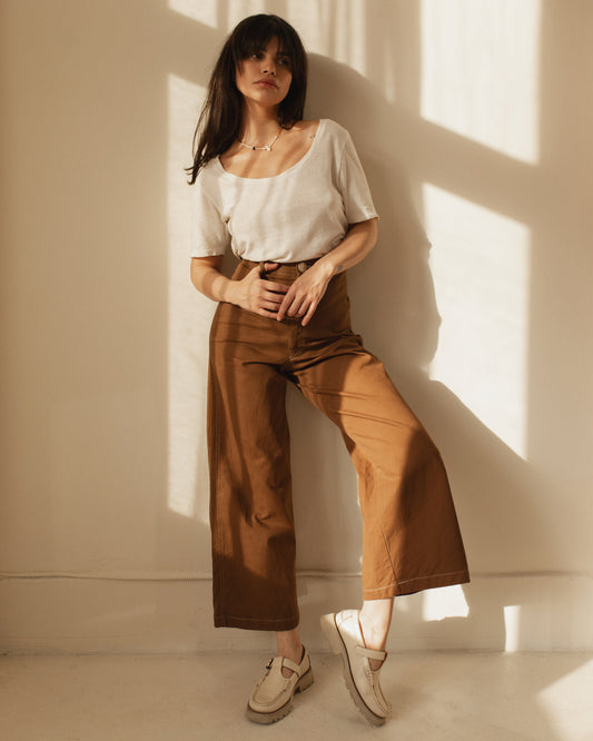 For the ultimate cool girl vibe! Based on Harly Jae's bestselling, form-fitting Pierrot Pants, this new style features a higher waist, unique back pockets, and cool contrast stitching - for a true ode to the 70s era. Handmade with organic cotton blend in Vancouver, BC.