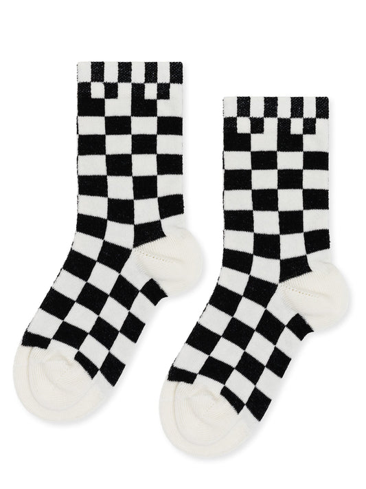 We're all about checkers right now. Our Mini Alice Crew is perfect for boys and girls. Each soft combed-cotton sock is sustainably made in Portugal at a family-run factory that operates entirely on renewable energy and Oeko-Tex certified for bonus pizazz.  cotton/polyamide/elastane made in portugal