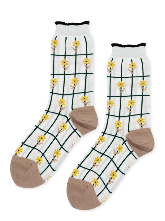 hansel from basel plot crew socks / Your garden may be taking a break for the season, but these soft-to-the-touch cotton-blend crews have sweet little flowers all lined up in a row.  This top-notch pair has a super high needle count for detailing and a hand-closed toe for extra comfort.