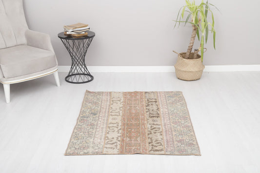 Gorgeous vintage rug from Turkey with earth toned colors and intricate, yet subtle designs. Measures 3.4 x 4.7' and made from 50% cotton and 50% wool. This Turkish rug has been professionally washed before we received it so it is 100% clean and ready to use. 