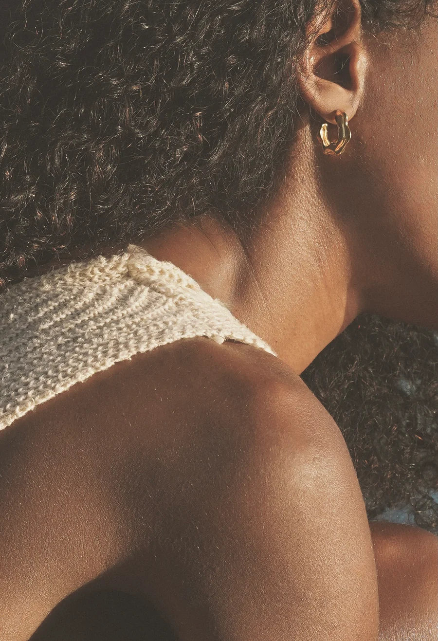 Richly textured hoops. Modern antiquity. Carved minimal light weight mid-size hoop stud earrings. A unique & organic take on a classic style. Handmade in the Santa Cruz Mountains.