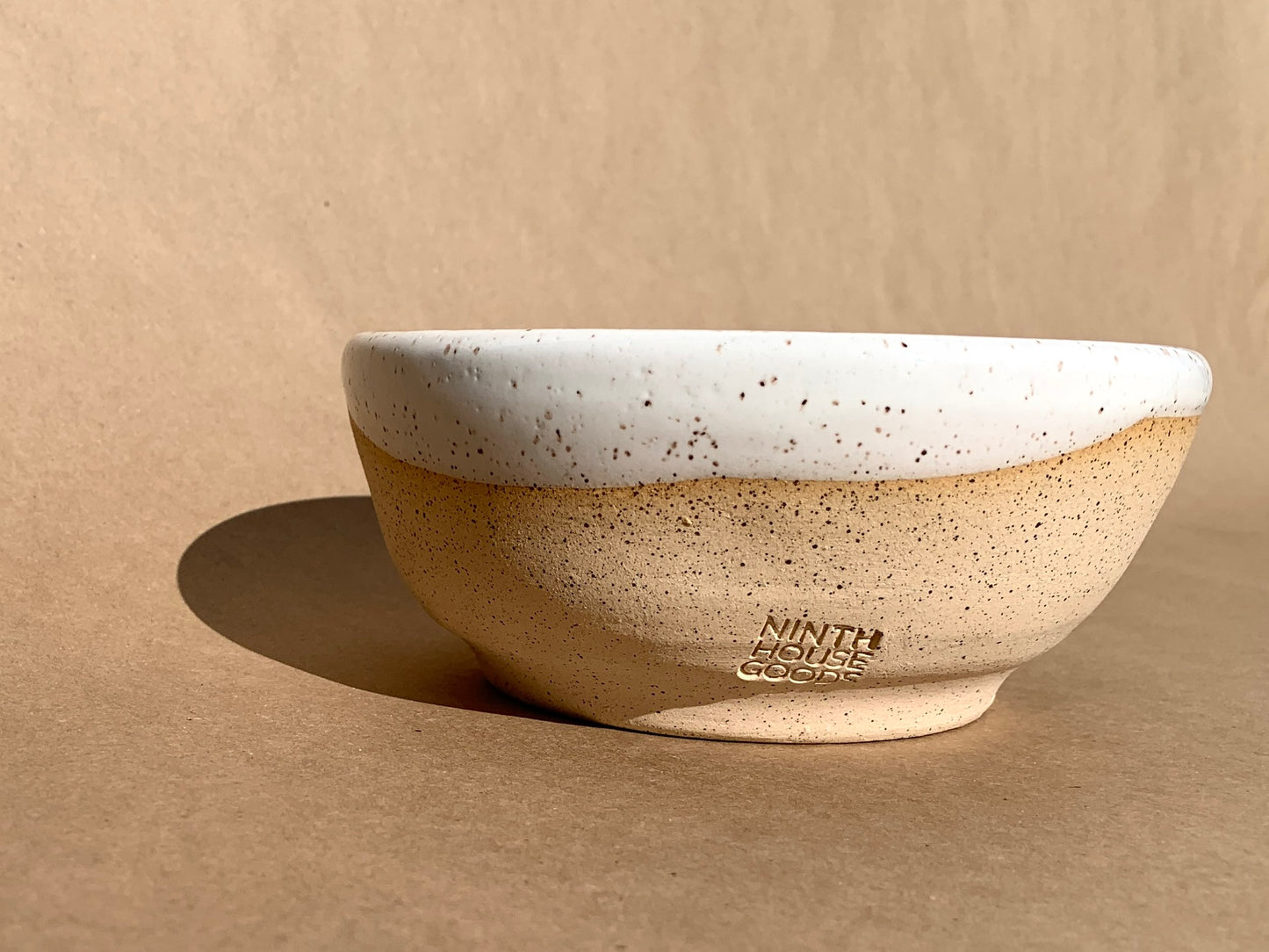 Beautiful smooth bowl great for soup and pasta or simply use it as a catchall. Hand thrown speckled clay with a white gloss glaze.