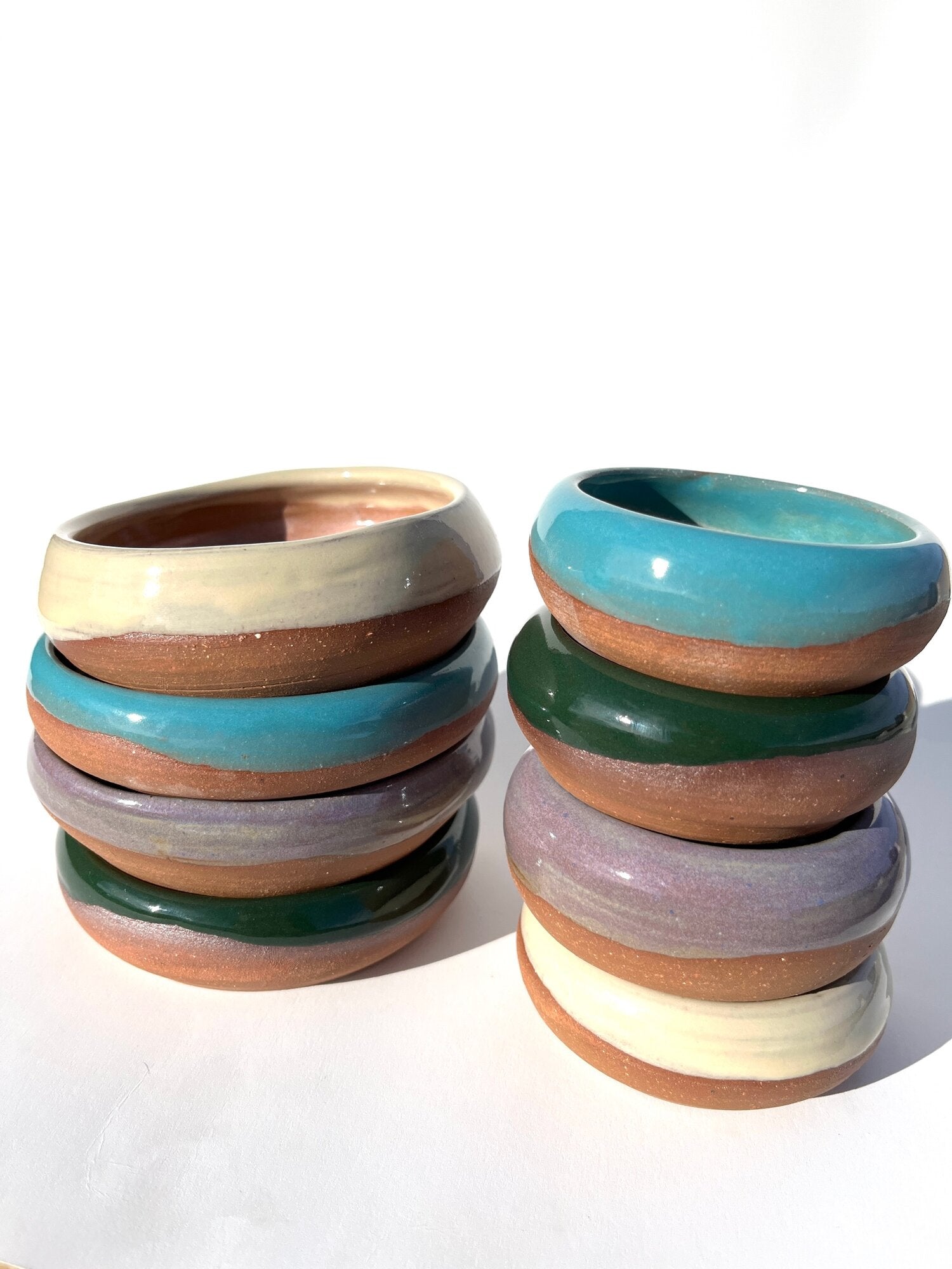 Hand thrown and hand dipped glazed ceramic nesting bowls by Ninth House Goods. A pair of nesting bowls that would be perfect for oil dipping, salsa, or your special jewels and artifacts.