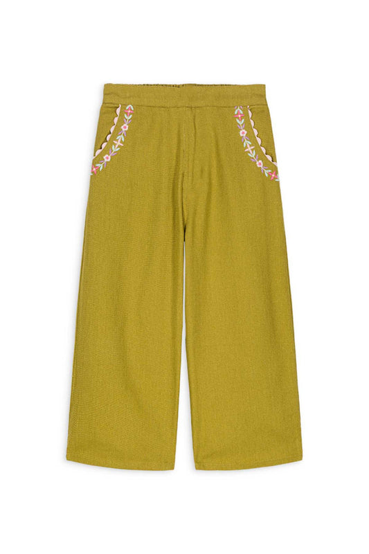 High comfort cotton canvas pants with a wide flare leg and elasticized waist in the back. Features embroidered pockets and is made with 100% organic cotton. Louise misha flor twill pants in moss.