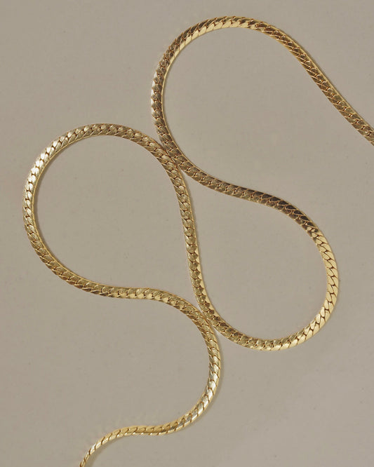 A dramatic flat braided 14kt gold fill chain necklace with fine detail - an elegant addition to any style, a dramatic decor to elevate and inspire. Handmade in the Santa Cruz Mountains.