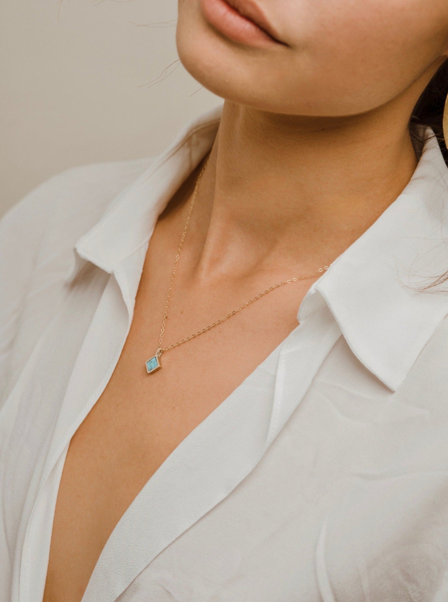 In this design, the delicate diamond shaped custom cut stone the real star. A tiny wearable work of natural stone art, a cut and polished slice of rock and mineral formed in the earth ~ a symbol of growth, development and change. Handmade in the Santa Cruz Mountains.