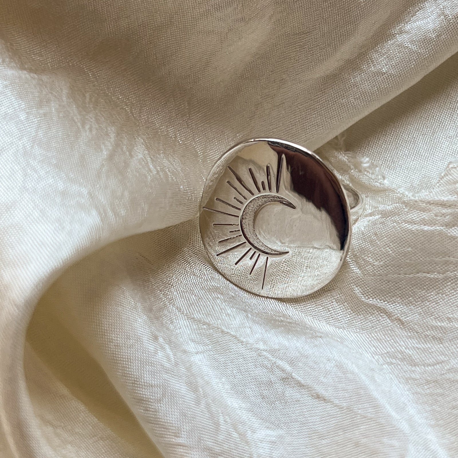 Created from an original hand carved wax and then cast into metal by artisans in Los Angeles, this statement piece has timeless elegance.  Beautifully engraved with a crescent moon, symbolizing regeneration and rebirth. Made from recycled brass or sterling silver - designed and handmade in Downtown Los Angeles.