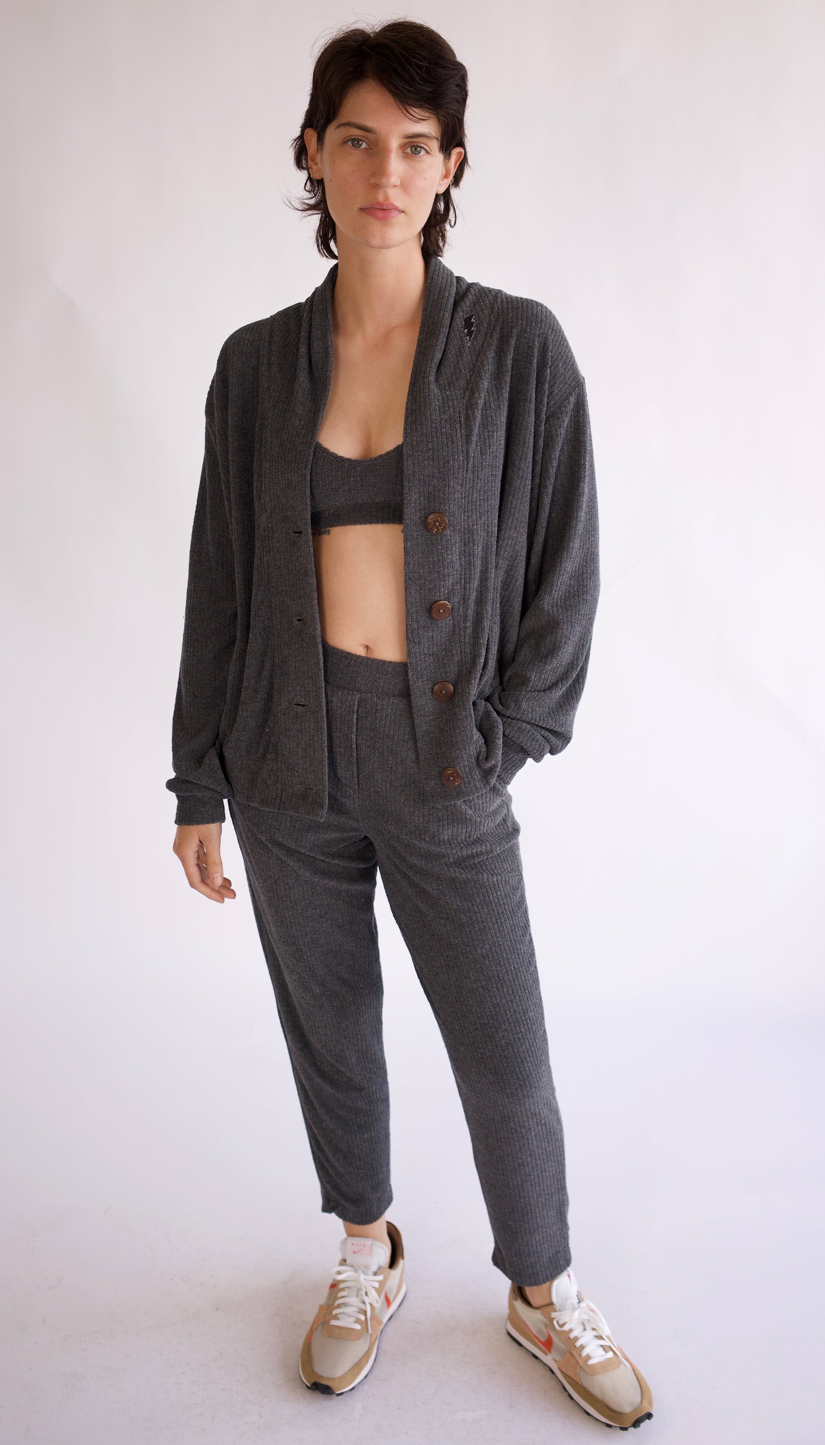 70’s inspired terry drop needle rib cardigan, charcoal dyed in small batches of 4 pieces at a time, each piece is unique. Chic yet uber comfy!