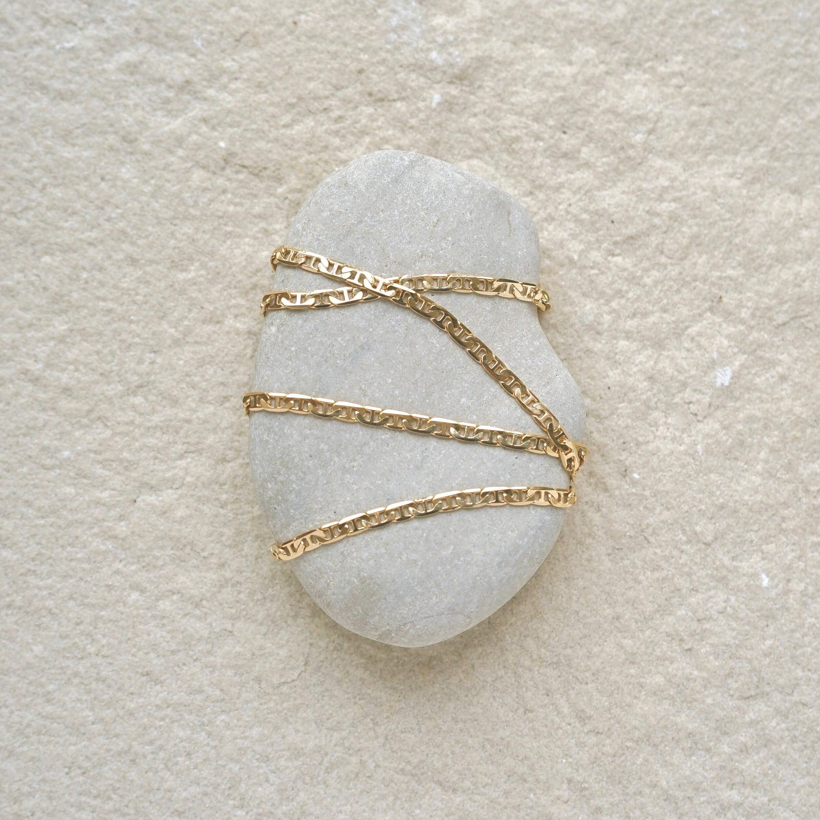 A simple braided chain intended to provide a ring of protection and luck when worn. 18k gold filled chain. Handmade in the Santa Cruz Mountains.