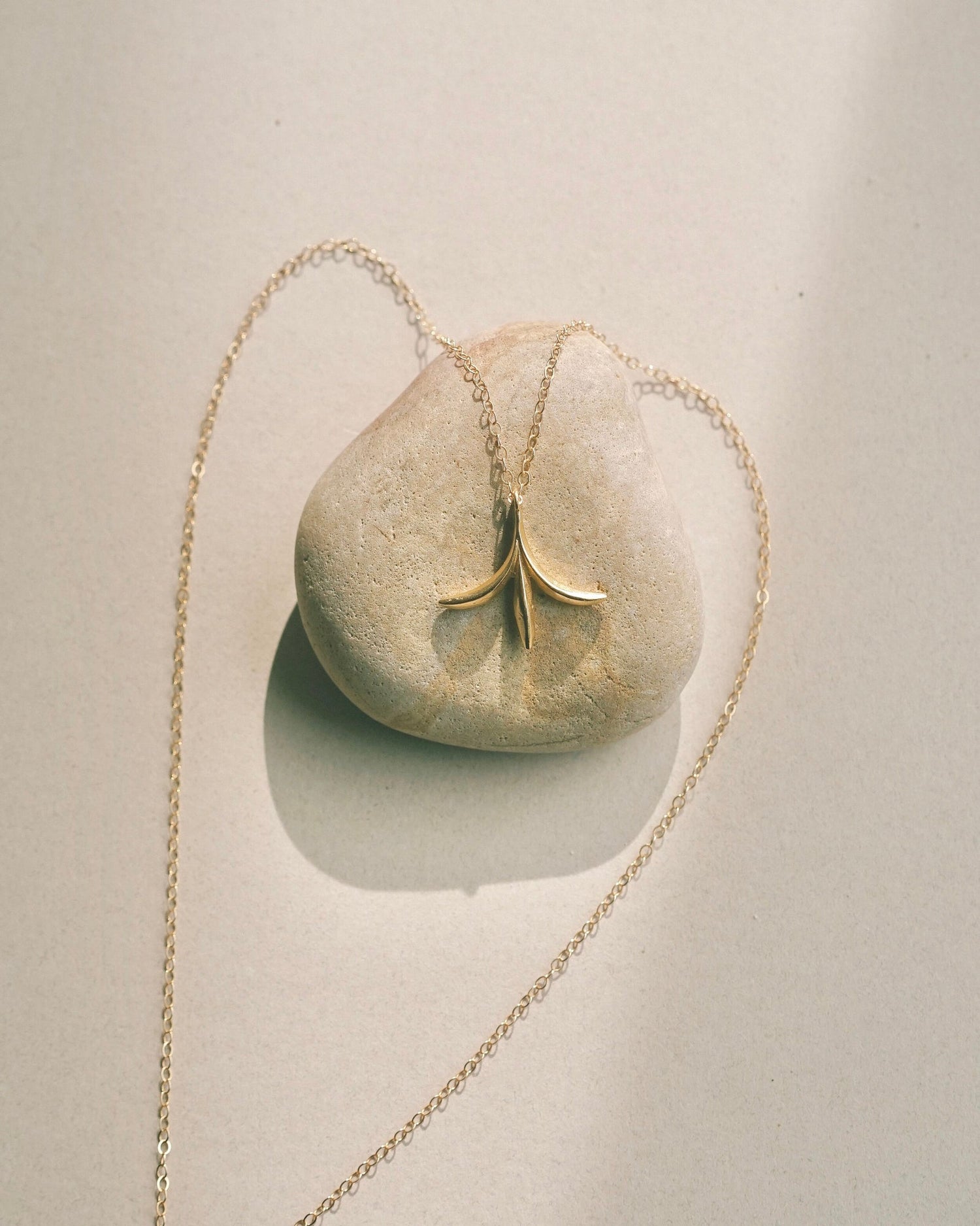 Delicate botanical enchanted pendant inspired by forest folklore and the seeds of the Calocedrus decurrens - California Incense Cedar tree. Handmade in the Santa Cruz Mountains.