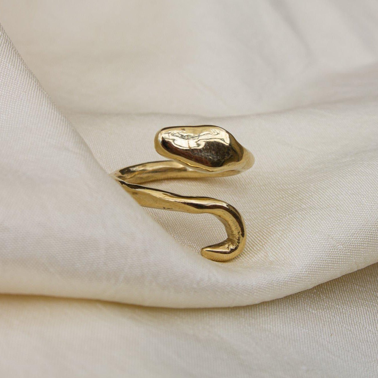 dea dia serpent wrap around adjustable ring in gold plated brass