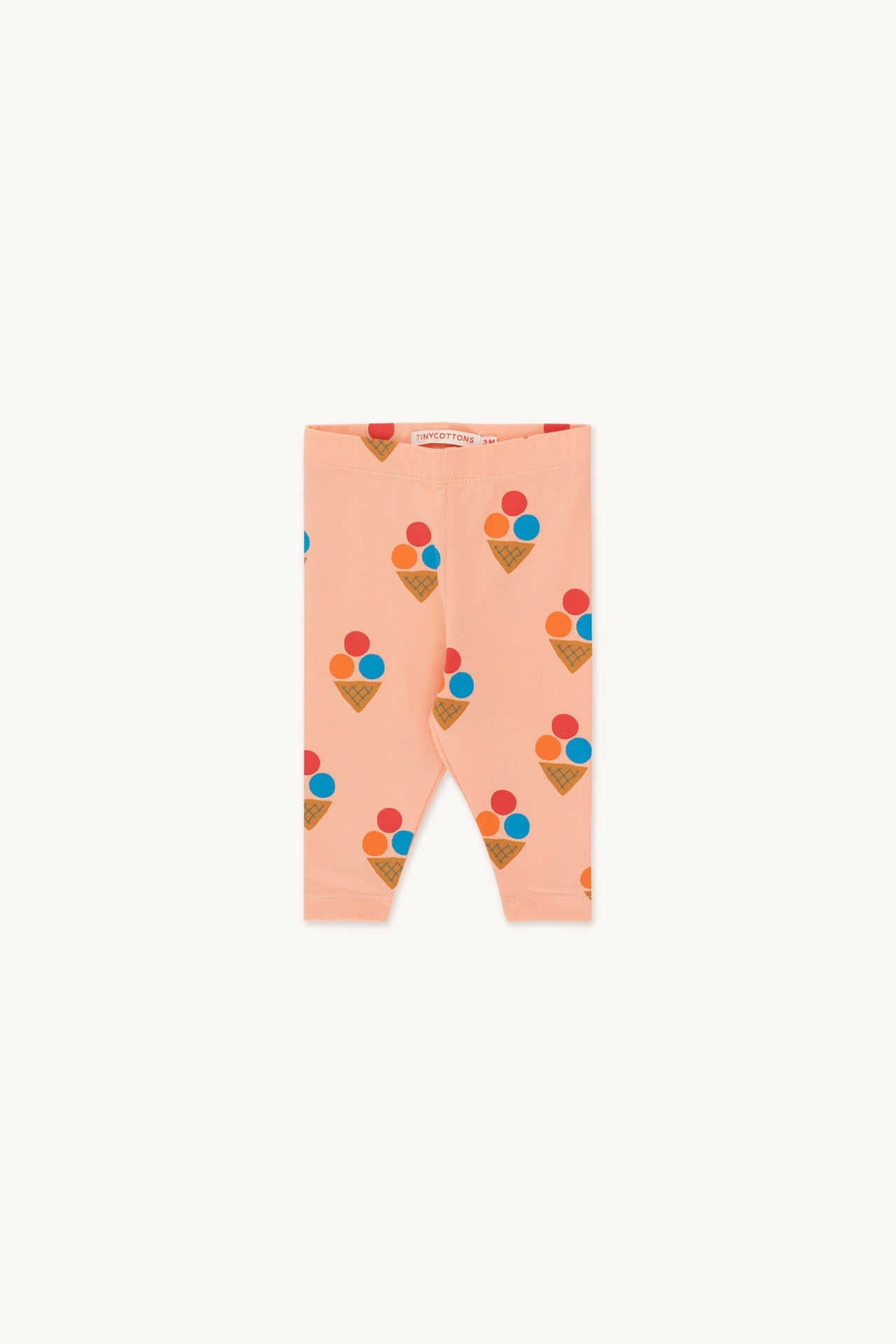 Light pink leggings with a minimal ice cream print and elasticized waistband. Crafted from soft pima cotton for maximum comfort. Made in Portugal.