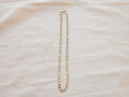 A luxurious thick and bold Figaro chain that looks great solo or layered. 20" long, gold fill. Designed and handmade in Downtown Los Angeles.