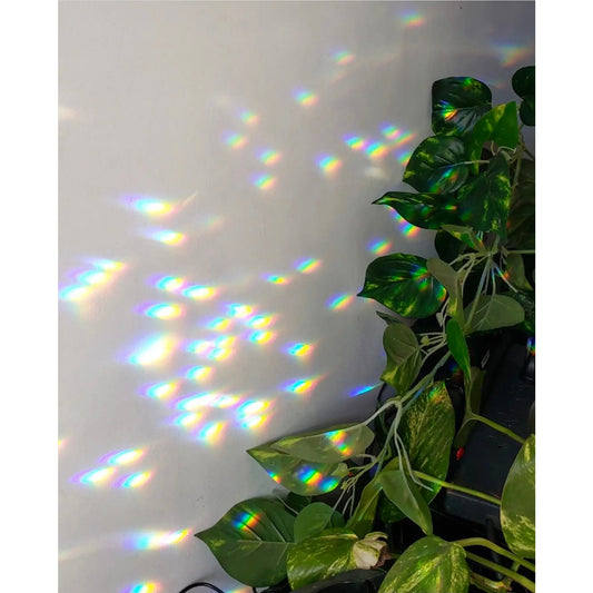 Artisan-crafted sun catcher made from brass wire/chain/tubing plus 3 vintage faceted crystals. Hang it near a window where sunlight will pour through and watch the little rainbows dance around. 
