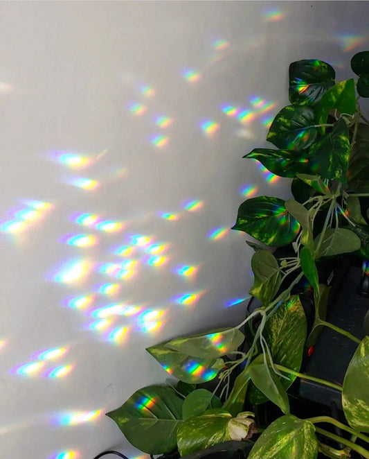 Artisan-crafted light catcher made from brass tubing and 2 vintage faceted crystals. Ready to hang in any space in your home - on a wall to brighten or in a window to catch the light.