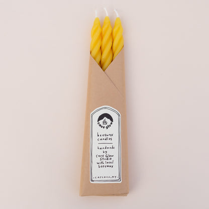 Set of three hand-crafted 9” beeswax candles. Made with pure beeswax, cotton wicks and natural dye. Comes in two color palettes: Dusk and Original