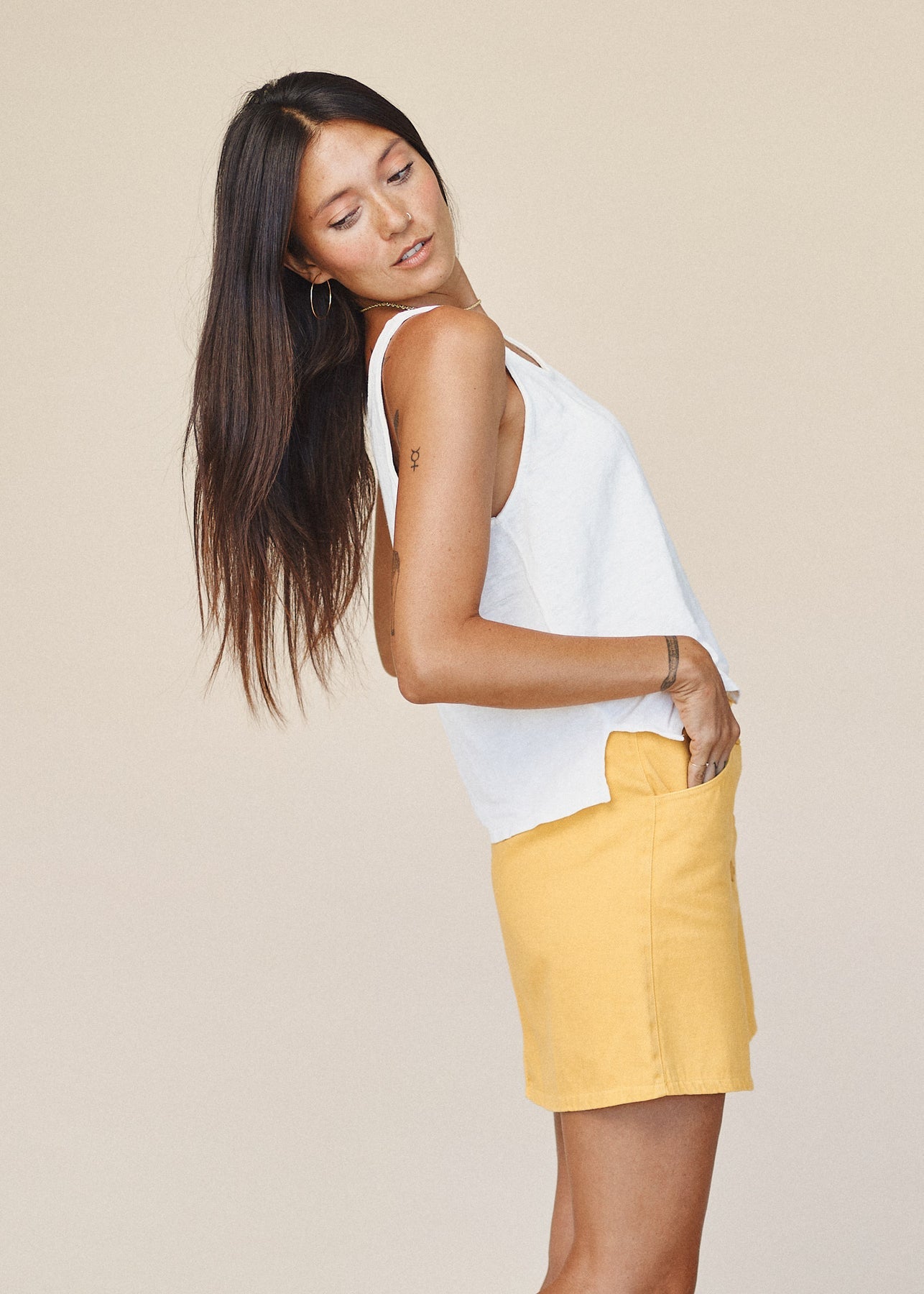 Classic button-down skirt. Fitted cut can be perfectly paired with a tucked, oversized top for effortless chic. 55% hemp, 45% organic cotton twill. Made with love in California.