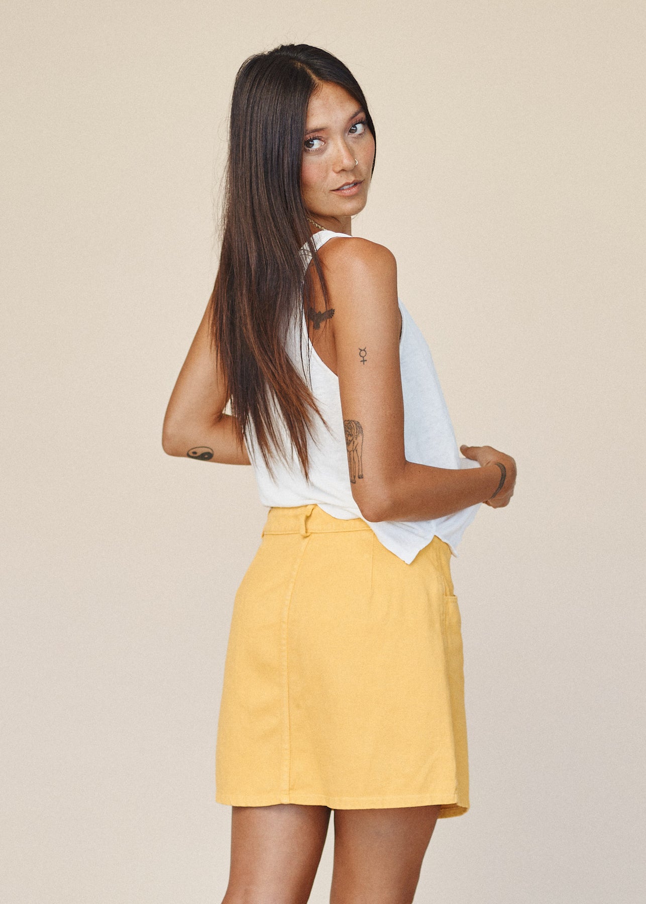 Classic button-down skirt. Fitted cut can be perfectly paired with a tucked, oversized top for effortless chic. 55% hemp, 45% organic cotton twill. Made with love in California.