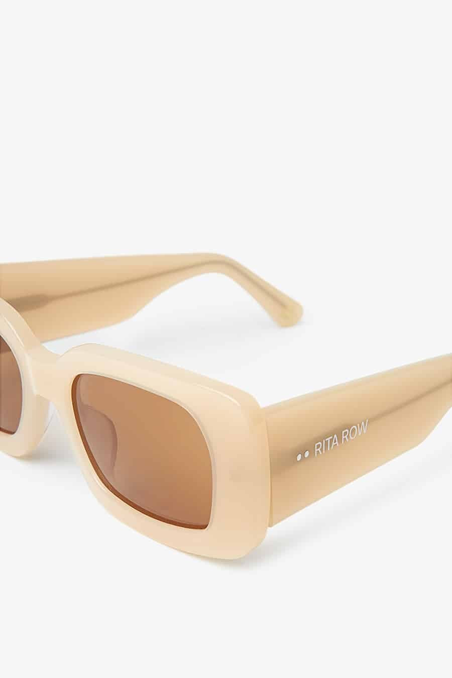 Throw on these oversized square sunnies to be the perfect statement to any outfit. 100% UV protection. Ethically made in Spain.