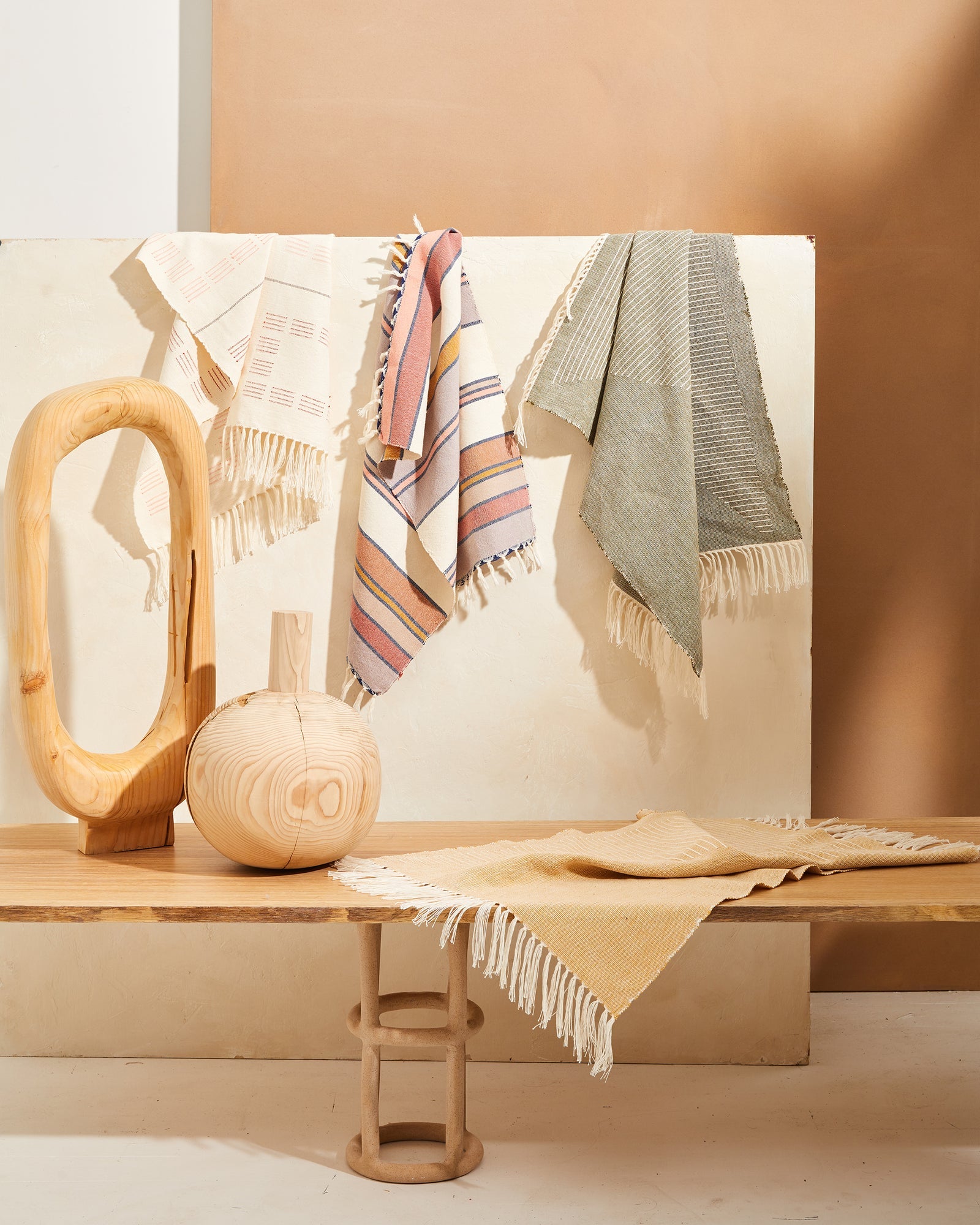 This tea towel is a classic yet modern addition to any kitchen or bathroom. Soft enough to function as hand towels, and durable enough to soak up spills around the kitchen. You can also use them as a centerpiece of a coffee or dining table. Finished with a rustic edge and fringe. Handwoven in Oaxaca, Mexico. 