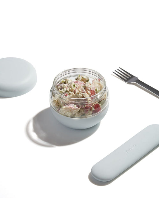 From soups to snacks, leak-proof your leftovers with this screw-top container. Crafted from durable borosilicate glass and wrapped in protective matte silicone, this eco-friendly alternative to plastic takeout containers is designed to encourage healthier everyday habits. BPA free and dishwasher and microwave safe.