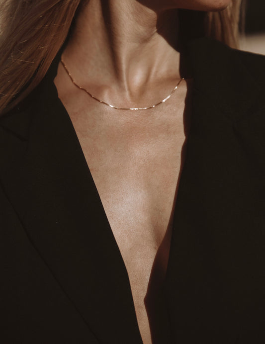 A delicate light weight classic box chain that’s light as air and catches the light just right, perfect for layering or adding a favorite pendant. Handmade in the Santa Cruz Mountains.