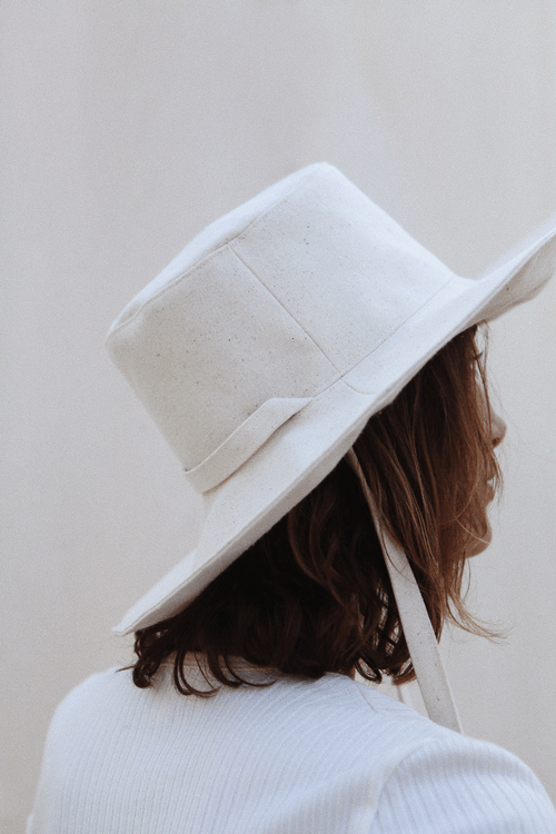 The Sun Hat by PairUp is made for sunny days — this extra wide hat will keep the rays off your cheeks and out of your eyes. Hand sewn in 100% sustainable cotton.