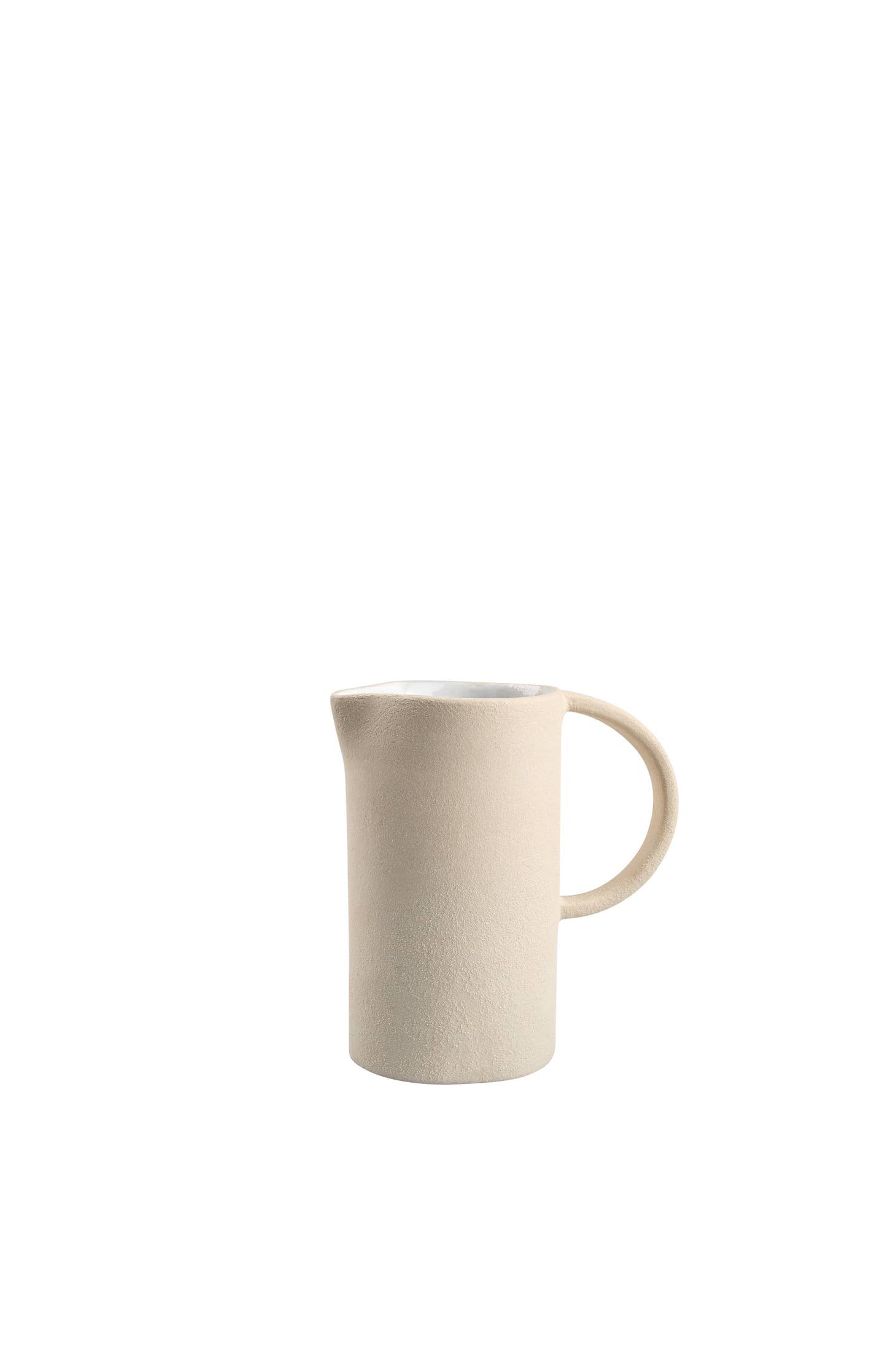 All purpose ceramic pitcher, hand crafted and finished with an interior white glaze. Dense stoneware keep hot liquids stay hot and cold liquids stay cold between pours. Handmade in Ukraine.