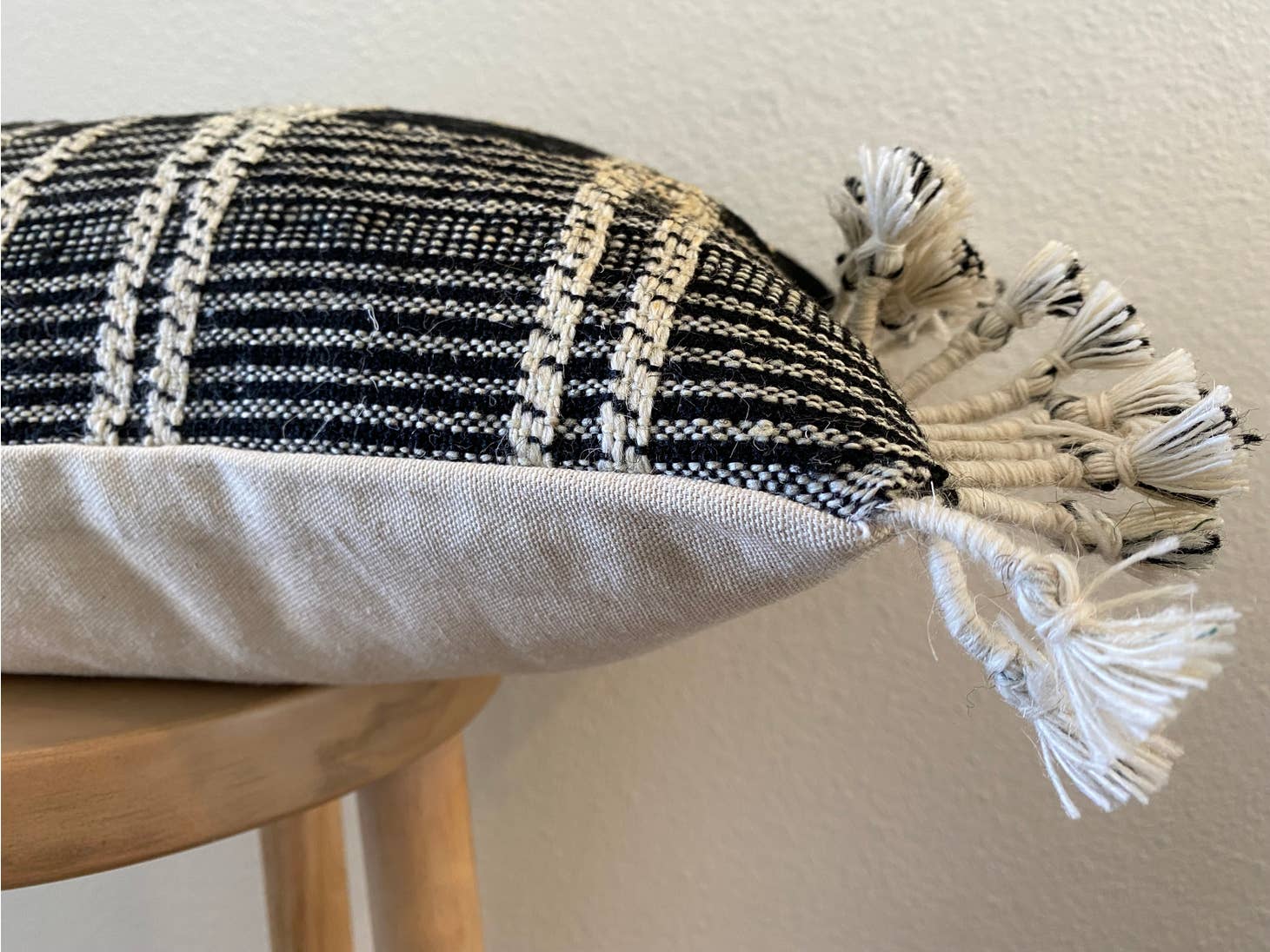 Gia 12" x 20" lumbar pillow designed in California and hand woven in India.