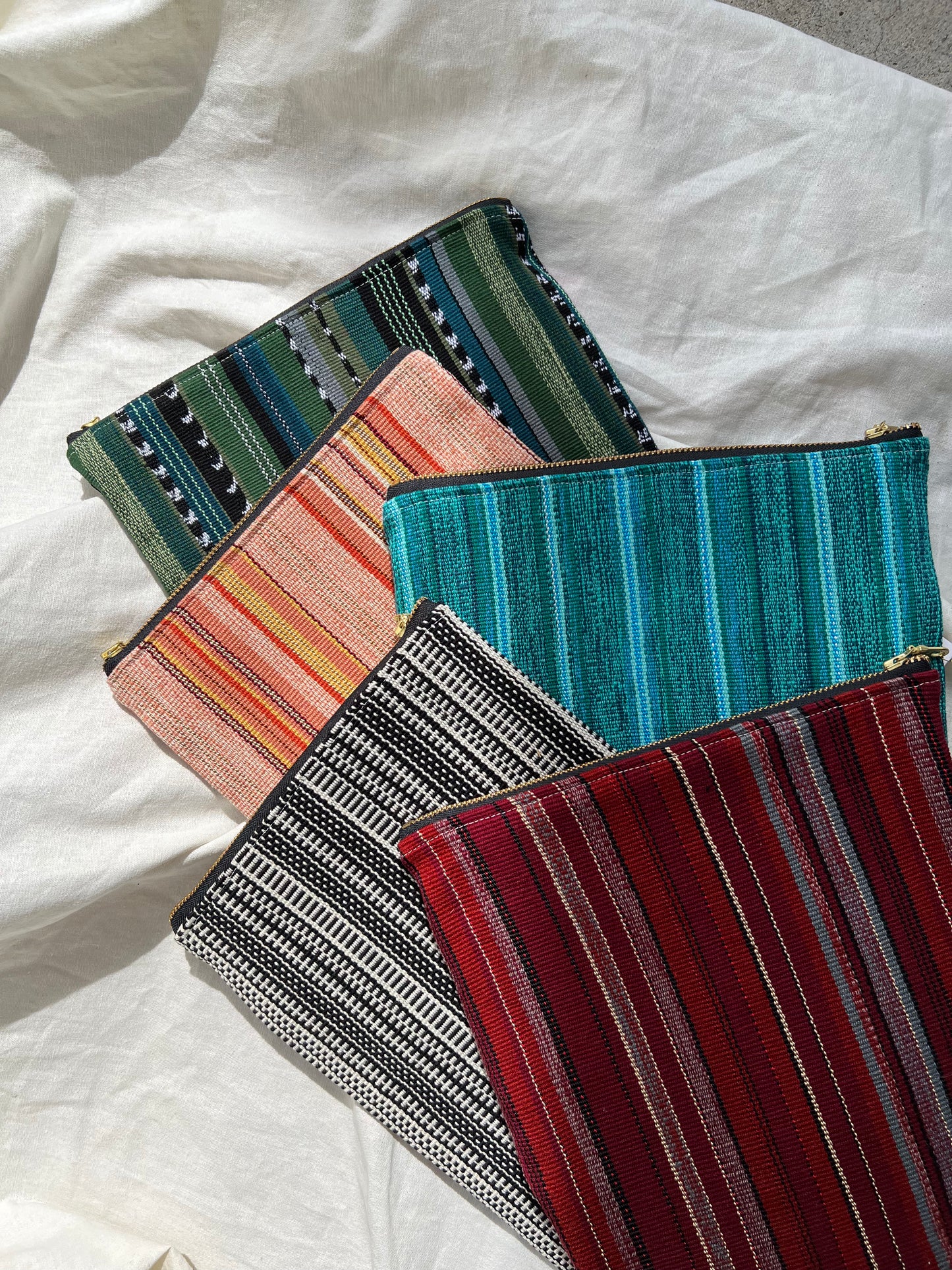 Handmade iPad Case made from fair trade textiles. This handmade iPad case features a naturally-dyed and fair trade textile from Guatemala. It is sewn by a resettled refugee paid above a living wage in San Diego, California. 