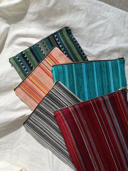 Handmade iPad Case made from fair trade textiles. This handmade iPad case features a naturally-dyed and fair trade textile from Guatemala. It is sewn by a resettled refugee paid above a living wage in San Diego, California. 