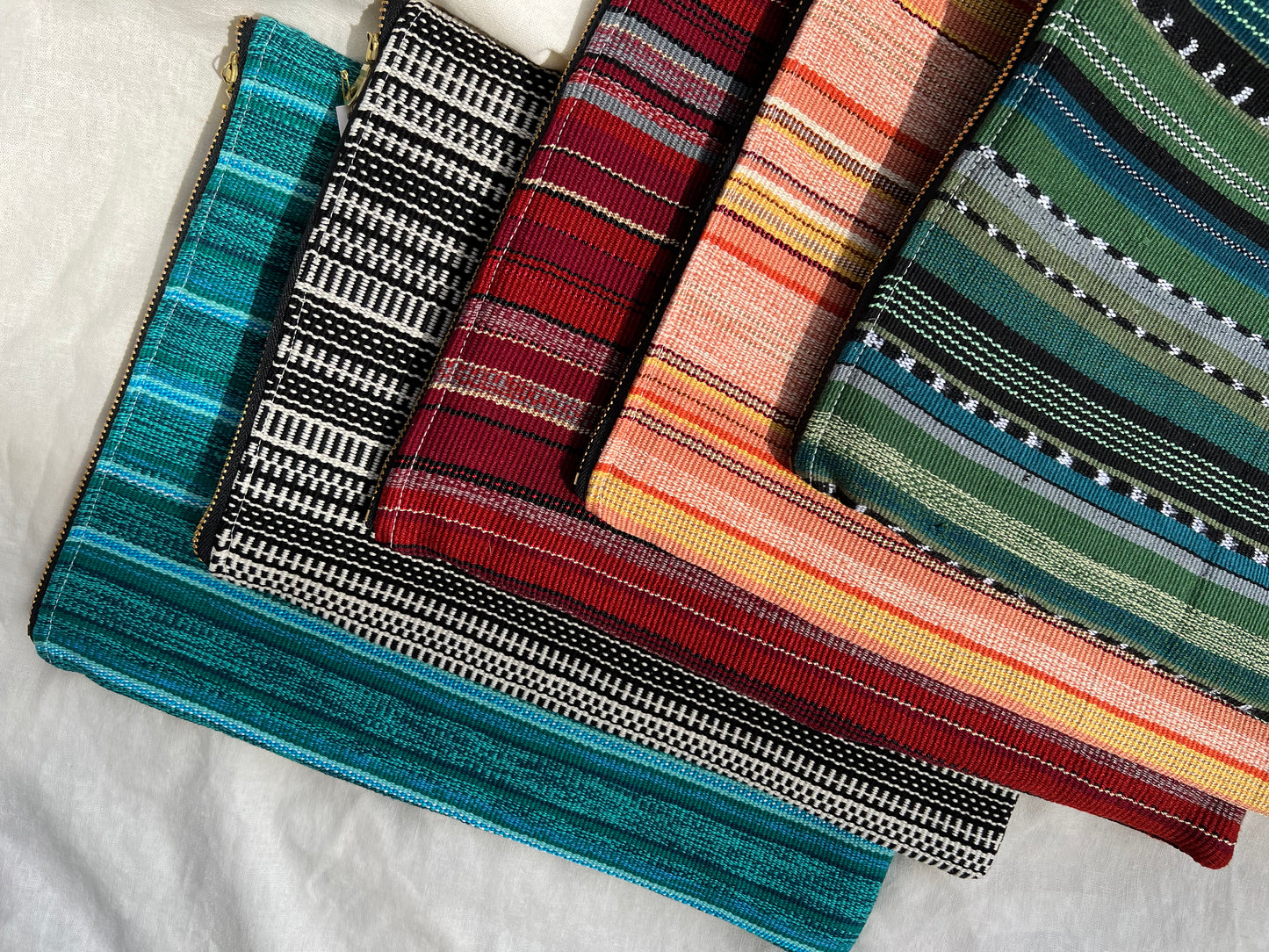 Handmade iPad Case made from fair trade textiles. This handmade iPad case features a naturally-dyed and fair trade textile from Guatemala. It is sewn by a resettled refugee paid above a living wage in San Diego, California. 