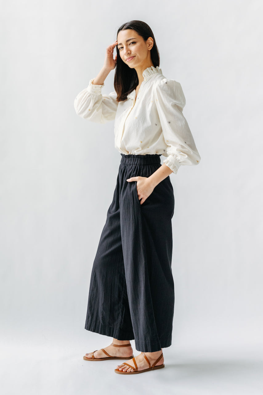 This paperbag waist pant is comfy, roomy, high waisted and wide legged. Wear it seaside with a swimsuit or with your favorite blouse tucked in. Ethically made in India.