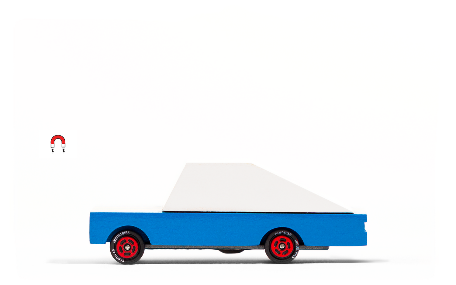 Blue Racer classic toy car by Candylab Toys features solid beech wood and water-based paints. Made sustainably, made to last, made for fun.  available at thread spun