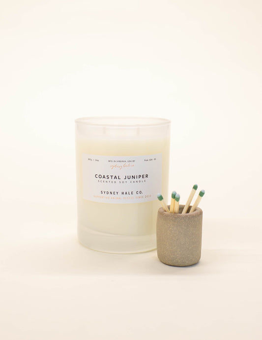 A small stoneware cylindrical match holder to perfectly accompany any candle. The surface of this piece also doubles as a match striker when using “strike anywhere” matches. All Jars of Dust pieces are handcrafted with great care in their Virginia Beach, VA studio from start to finish. 
