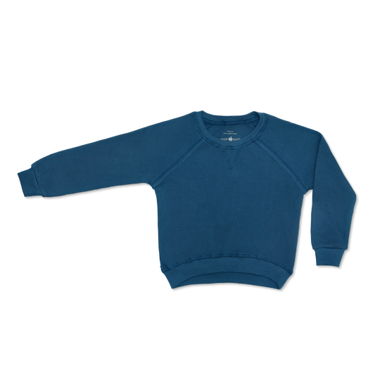 An extra soft 100% organic cotton waffle crew neck henley is a must-have staple for any little one's wardrobe. Pair with the Waffle Joggers!