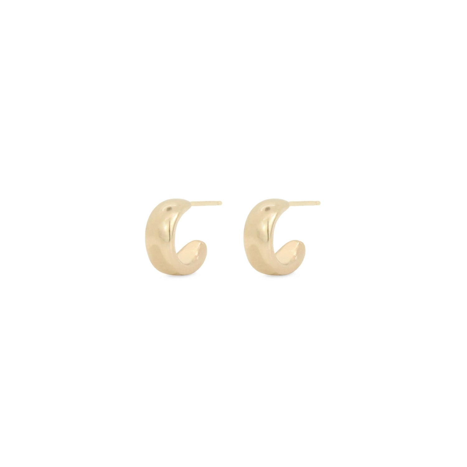 Organic and understated hoops with a luxurious feel.  The Cocoon Hoops hug the earlobe just perfectly.  Details:  hand cast in bronze or sterling silver 1 cm across sterling silver posts + backs