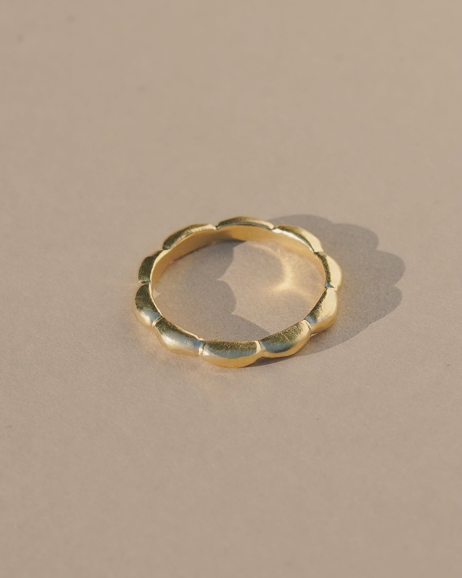 Sleek, shiny floral inspired petal ring, with a smooth scalloped edge, intended to represent blooming growth and development. Available in Gold Vermeil or Sterling Silver. Handmade in the Santa Cruz Mountains.